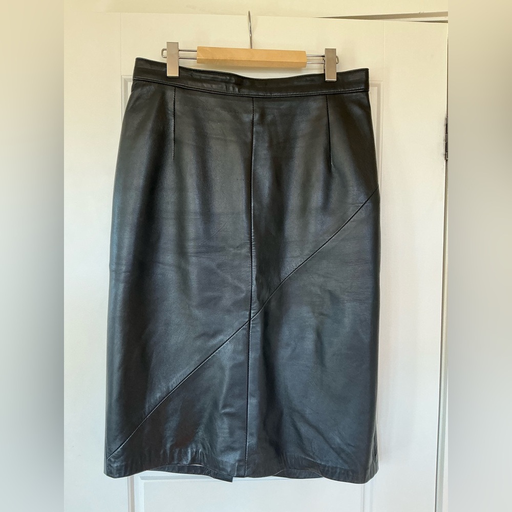 Women’s black leather skirt. 32 inches waist line